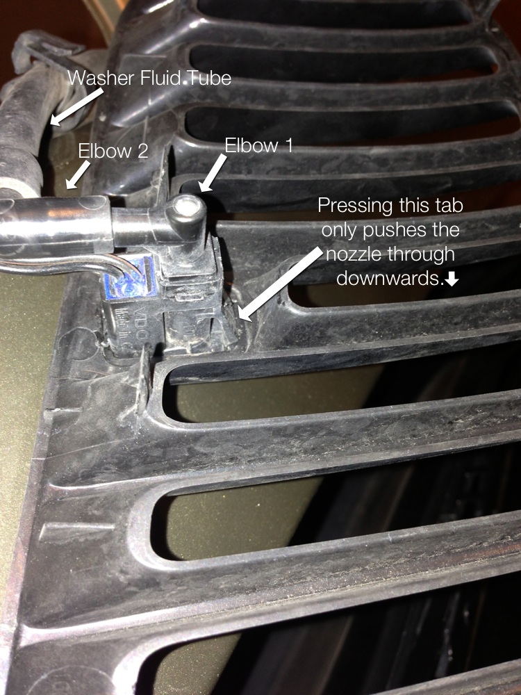 Help removing windshield washer nozzle elbow/tube (Picture attached